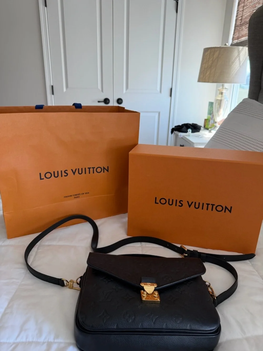 Louis Vuitton Black Embossed Monogram Pochette Métis bag with gold hardware - Picture 16 of 16